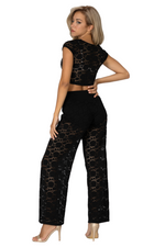 Load image into Gallery viewer, Woman wearing a black lace top and pants set on a white background