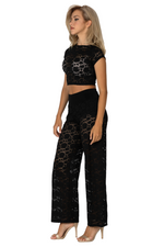 Load image into Gallery viewer, Woman wearing a black lace outfit on a white background