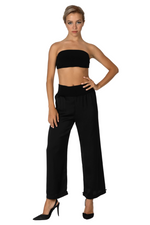 Load image into Gallery viewer, Woman wearing a black strapless top and wide-leg pants on a white background