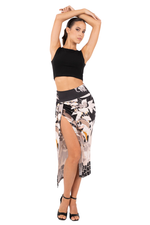 Load image into Gallery viewer, Woman wearing a black crop top and patterned skirt on a white background