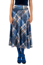 Load image into Gallery viewer, Plaid skirt worn by a person on a white background