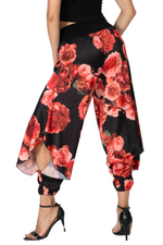 Load image into Gallery viewer, Floral pants with red flowers on a black background