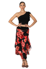 Load image into Gallery viewer, Woman wearing a black one-shoulder top and red floral skirt on a white background