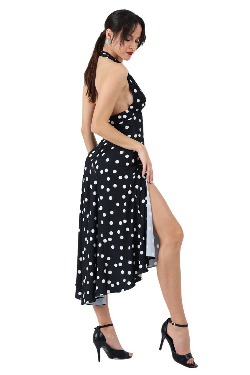 princess polly baby blue dress Victoria Beckham, wearing a black zib back dress, walks up the stairs of  Barneys New York in Beverly Hills where she spent an Stock Photo main image 0
