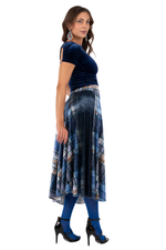 Load image into Gallery viewer, Woman wearing a blue top and patterned skirt on a white background

