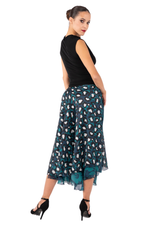 Load image into Gallery viewer, Woman wearing a black top and floral skirt on a white background
