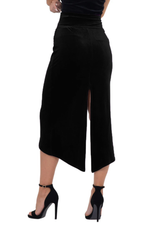 Load image into Gallery viewer, Black skirt with a high slit worn by a person on a white background
