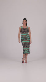 Load and play video in Gallery viewer, Abstract Animal Print Low Back Midi Fishtail Dress
